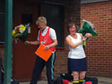 A woman being given an award