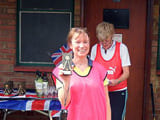 A woman being given an award