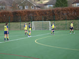 A team playing in an astro field