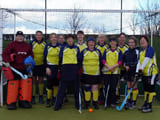 A team posing infront of a goal